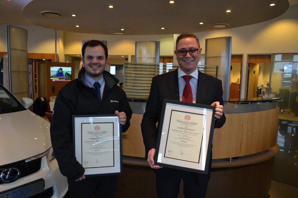 David and Nigel receive their awards.